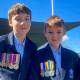 Dean Irwin (Year 6) and Aiden Irwin (Year 3) with their great grandfather's medals. Picture supplied