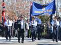 The Springwood Anzac Day march 2024 makes its way up Macquarie Road. Picture by Damien Madigan
