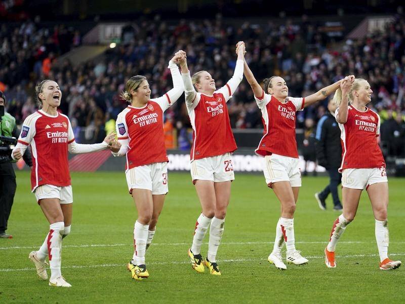 Matildas Steph Catley (l), Kyra Cooney-Cross (2l) and Caitlin Foord (2r) celebrate Arsenal's win. (AP PHOTO)