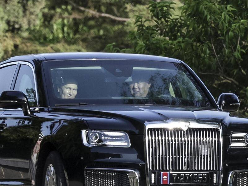 Kim Jong-un has driven a Russian Aurus limousine carrying Russian President Vladimir Putin. (AP PHOTO)
