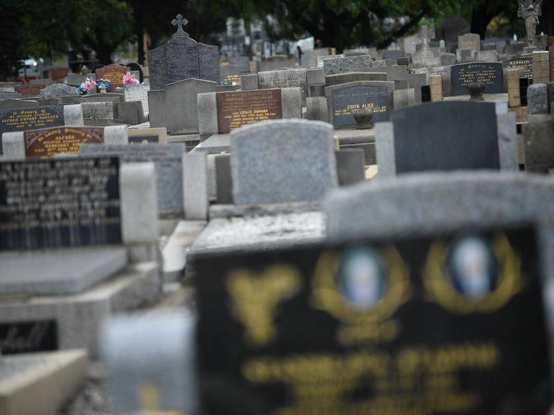 A row has erupted over a bill to hand control of Sydney's major cemeteries to the Catholic Church. (Joel Carrett/AAP PHOTOS)